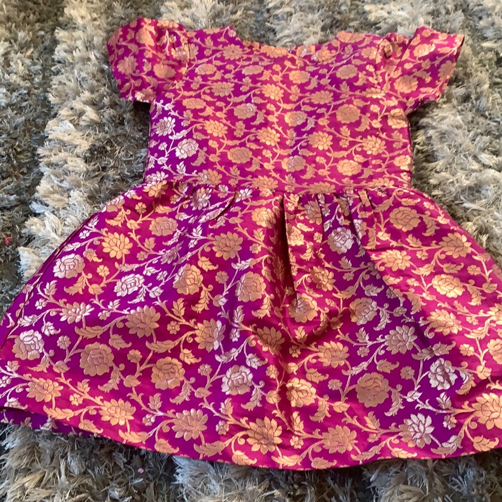 Metallic fuchsia and gold dress.